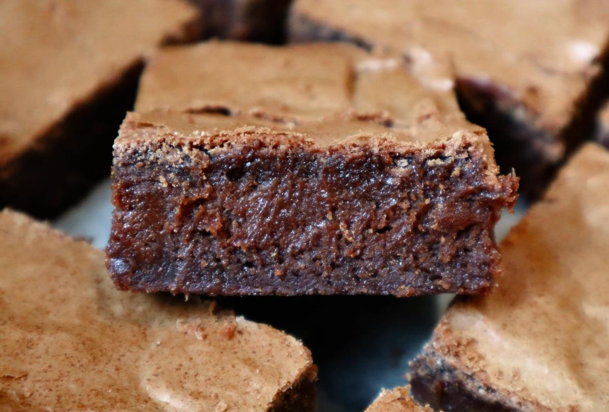 Close-up of fudgy brownie showing soft, moist chocolate center