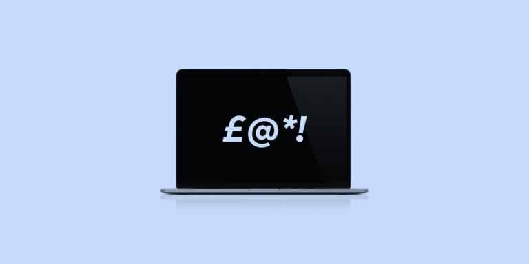 Laptop saying "£@*!"