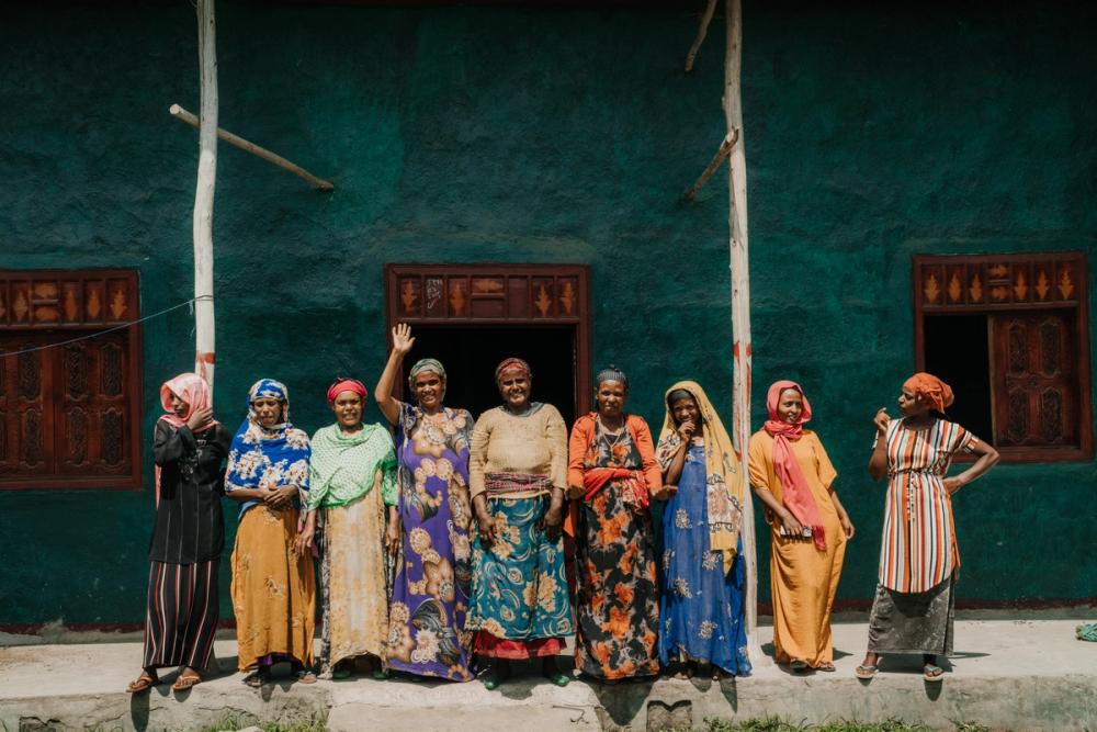 A community gathered where a water project was built