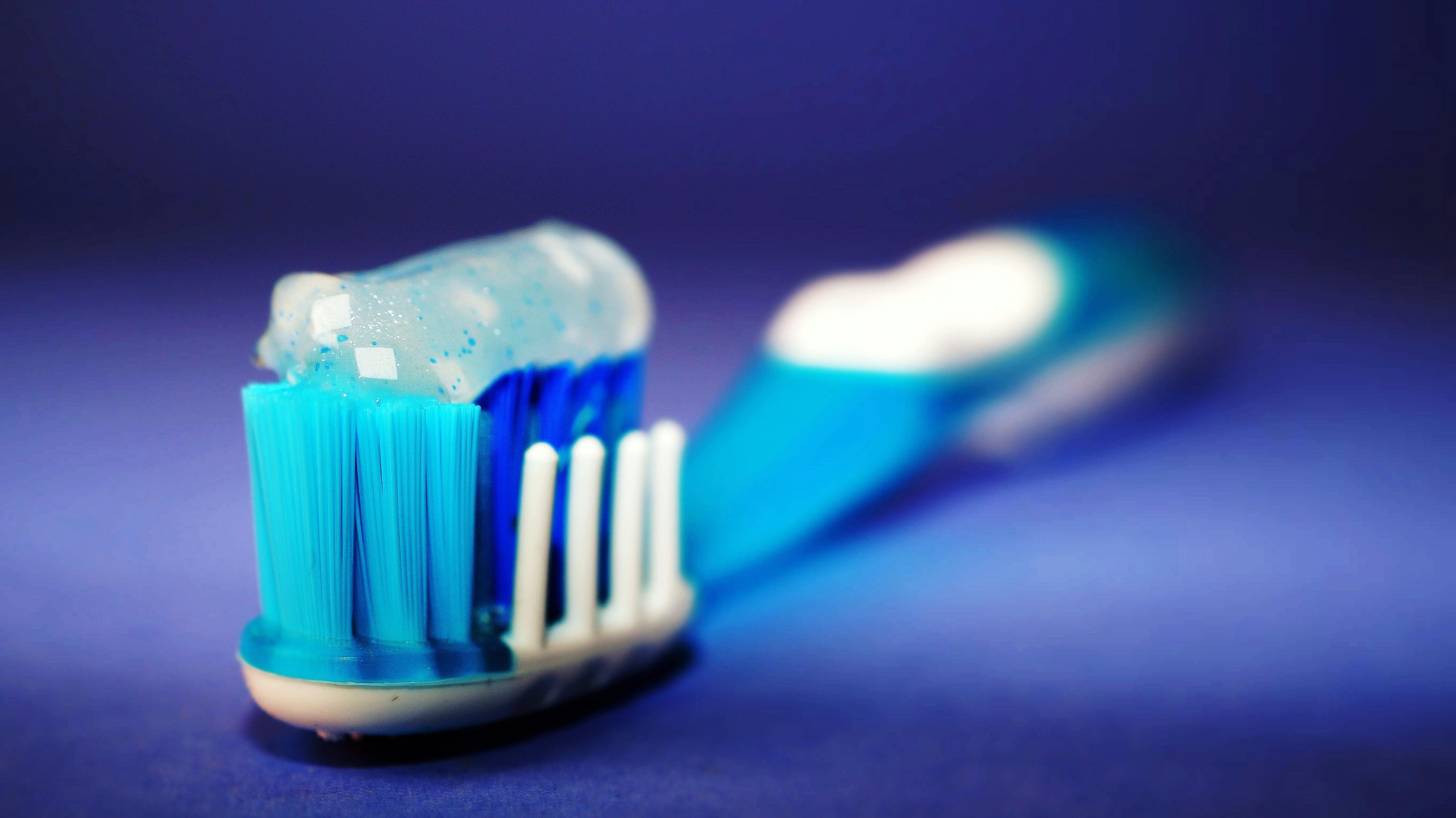 Toothbrush representing dental hygiene for blog post '10 Ways To Keep Your Teeth Healthy'