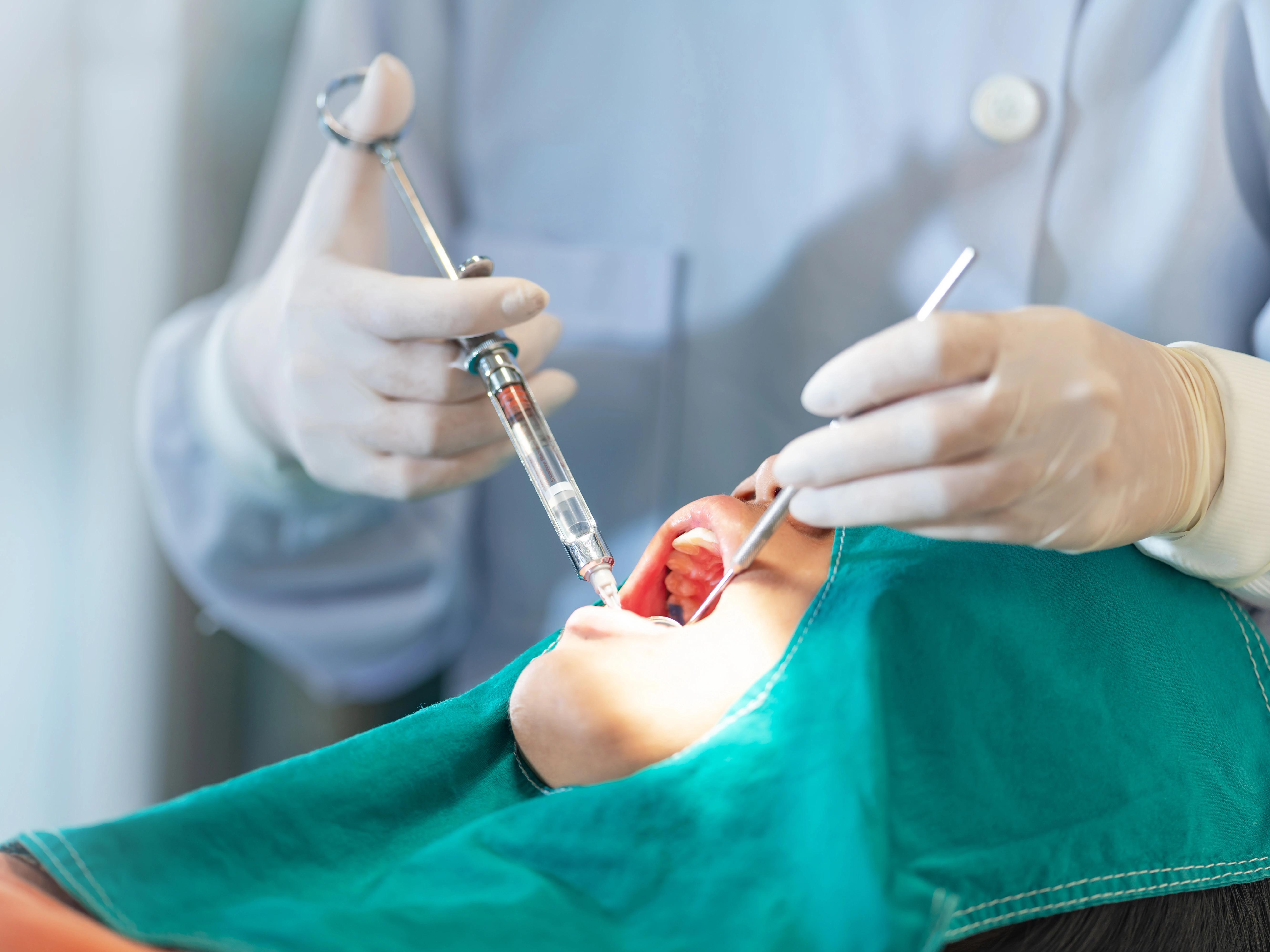 Girl getting oral surgery