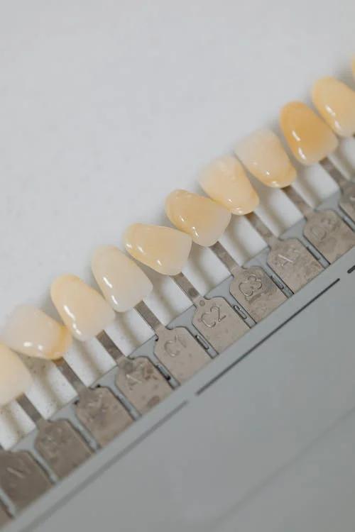 A row of teeth with yellow and white.