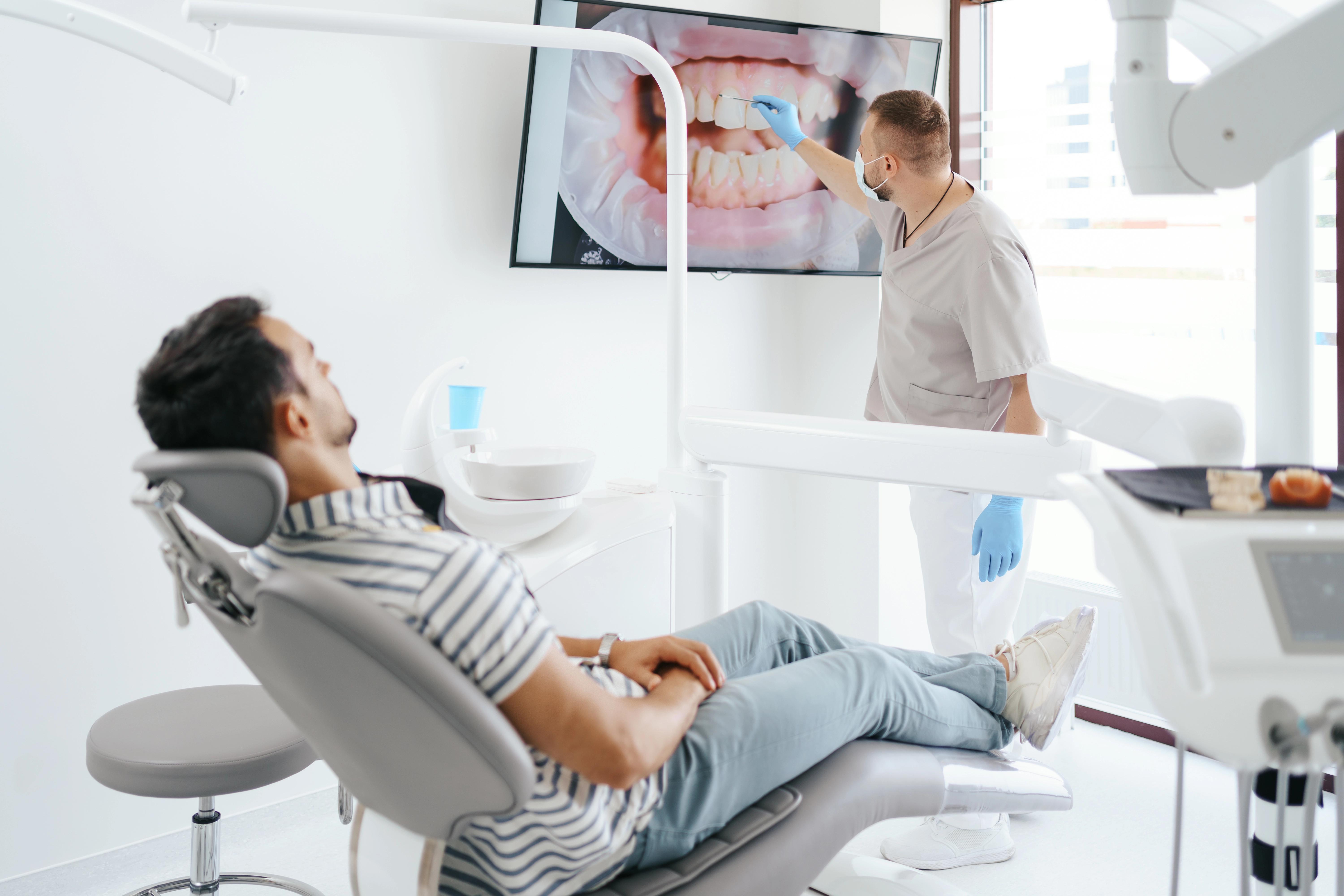 dentist discussing with patient
