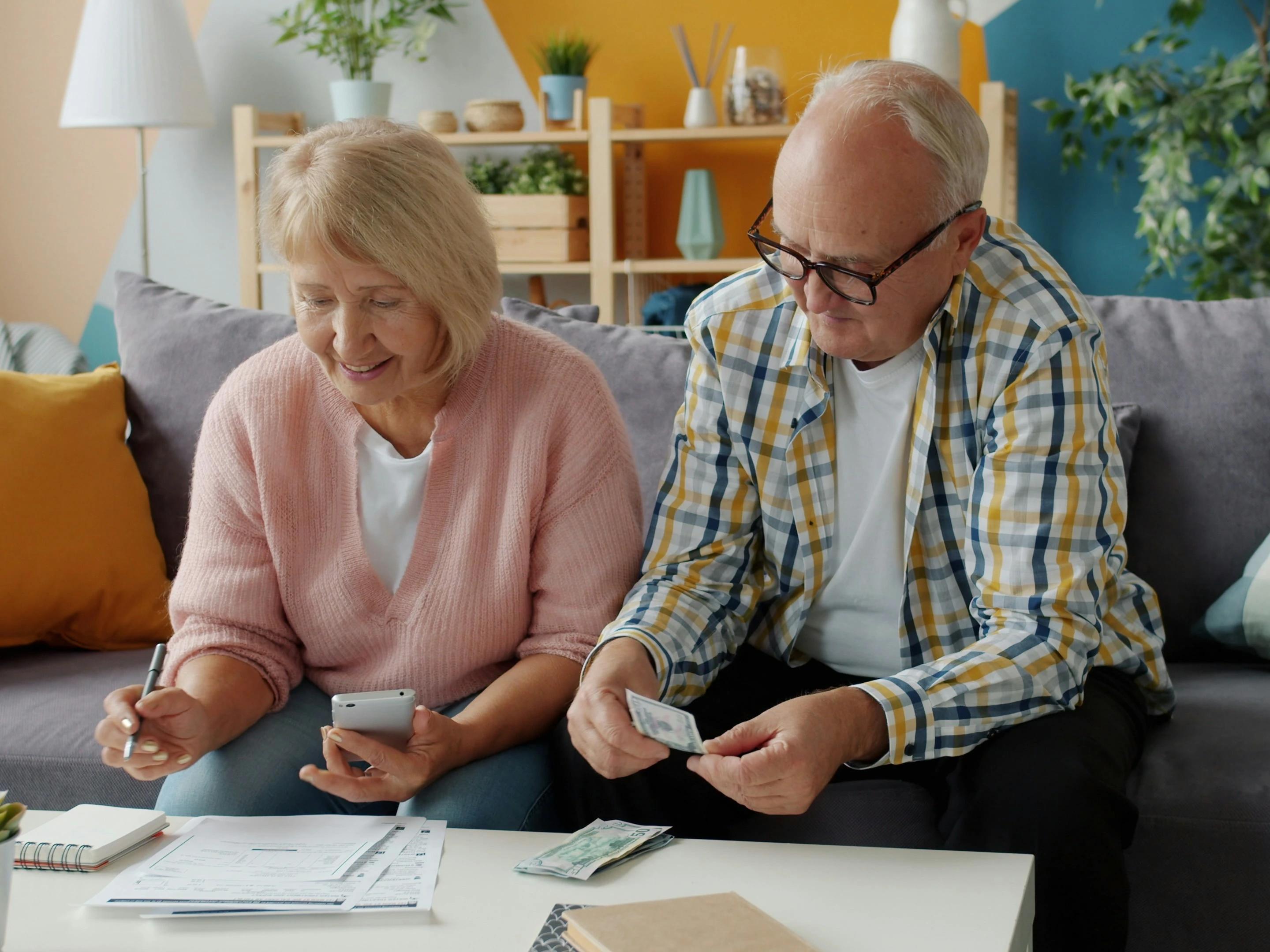 Couple comparing dental treatment costs.