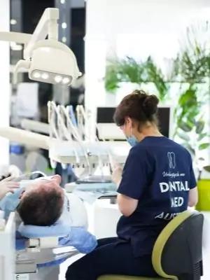 Photo of doctors performing a dental procedure in Dental Med Austria Clinic