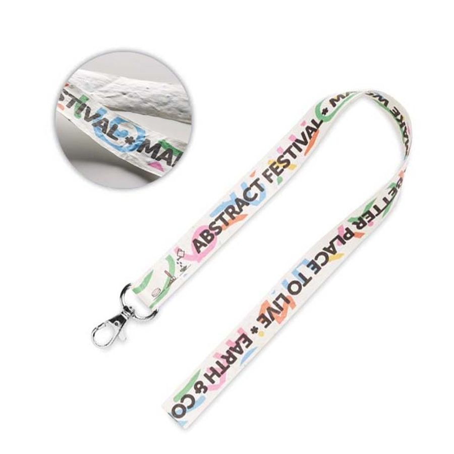 A seed paper lanyard with an example print and a metal hook.