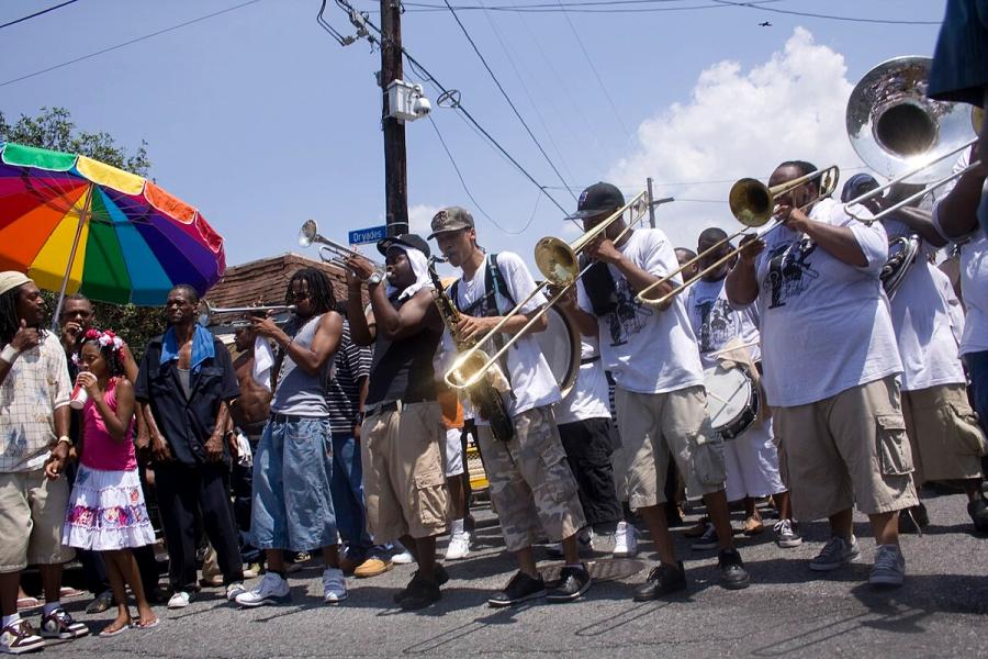 Central City New Orleans. Perfect Gentlemen Social Aid & Pleasure Club parade. Derek Bridges, CC BY 2.0 <https://creativecommons.org/licenses/by/2.0>, via Wikimedia Commons