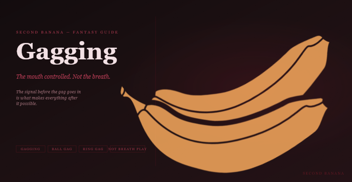 Dark editorial header image for the Second Banana gagging guide, burgundy and rose palette. A near-black background with a deep red rule across the top. Left column reads "Gagging" in large dusty rose-white bold serif type at 82px, with the subtitle "The mouth controlled. Not the breath." in rose italic and the three-line tagline "The signal before the gag goes in is what makes everything after it possible." Tag pills along the bottom left read Gagging, Ball Gag, Ring Gag, Not Breath Play in deep rose. A banana illustration in warm rose-red tones lies diagonally across the right side. Second Banana branding lower right.