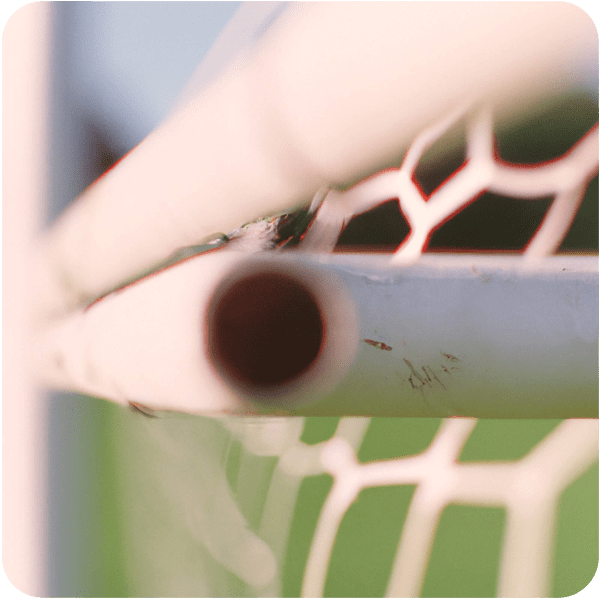 Close up of a soccer goal post vibrating, 35mm