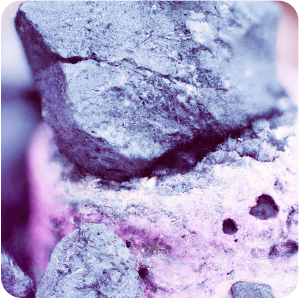 Close up of stone turning from charcoal to purple, 35mm