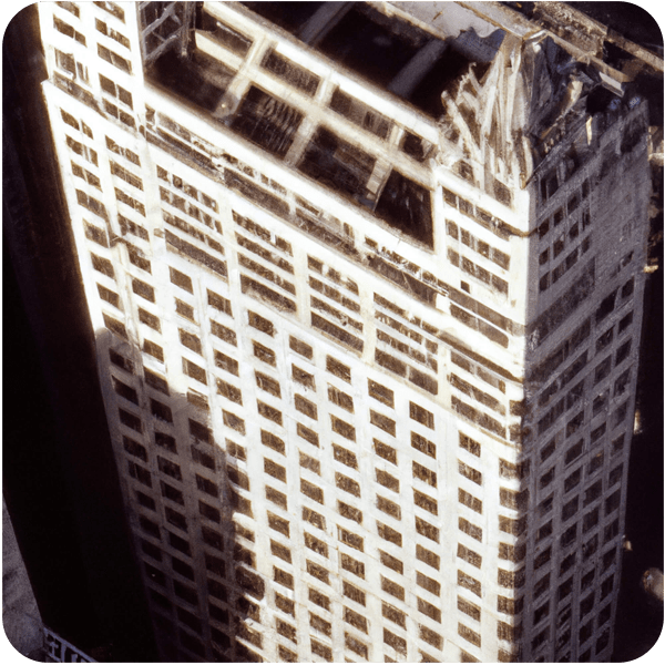 A Beaux-Arts high-rise in Chicago in the late 1980s seen from above, 35mm