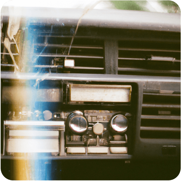 A visual representation of static playing on a radio in an old 80s Buick, 35mm