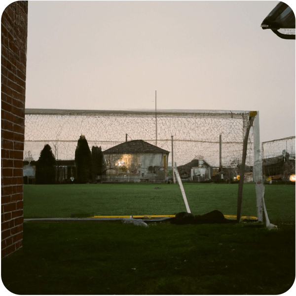 A backyard backing onto big soccer field in a suburb of Toronto, 35mm