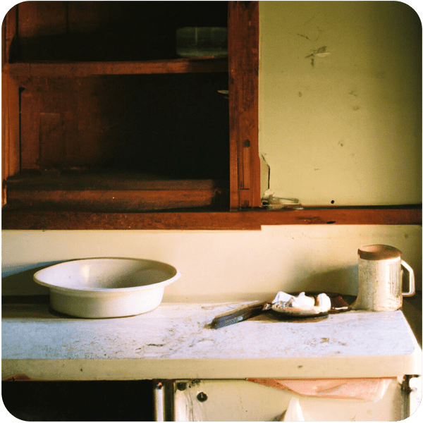 Scene from a memory about an empty farmhouse kitchen