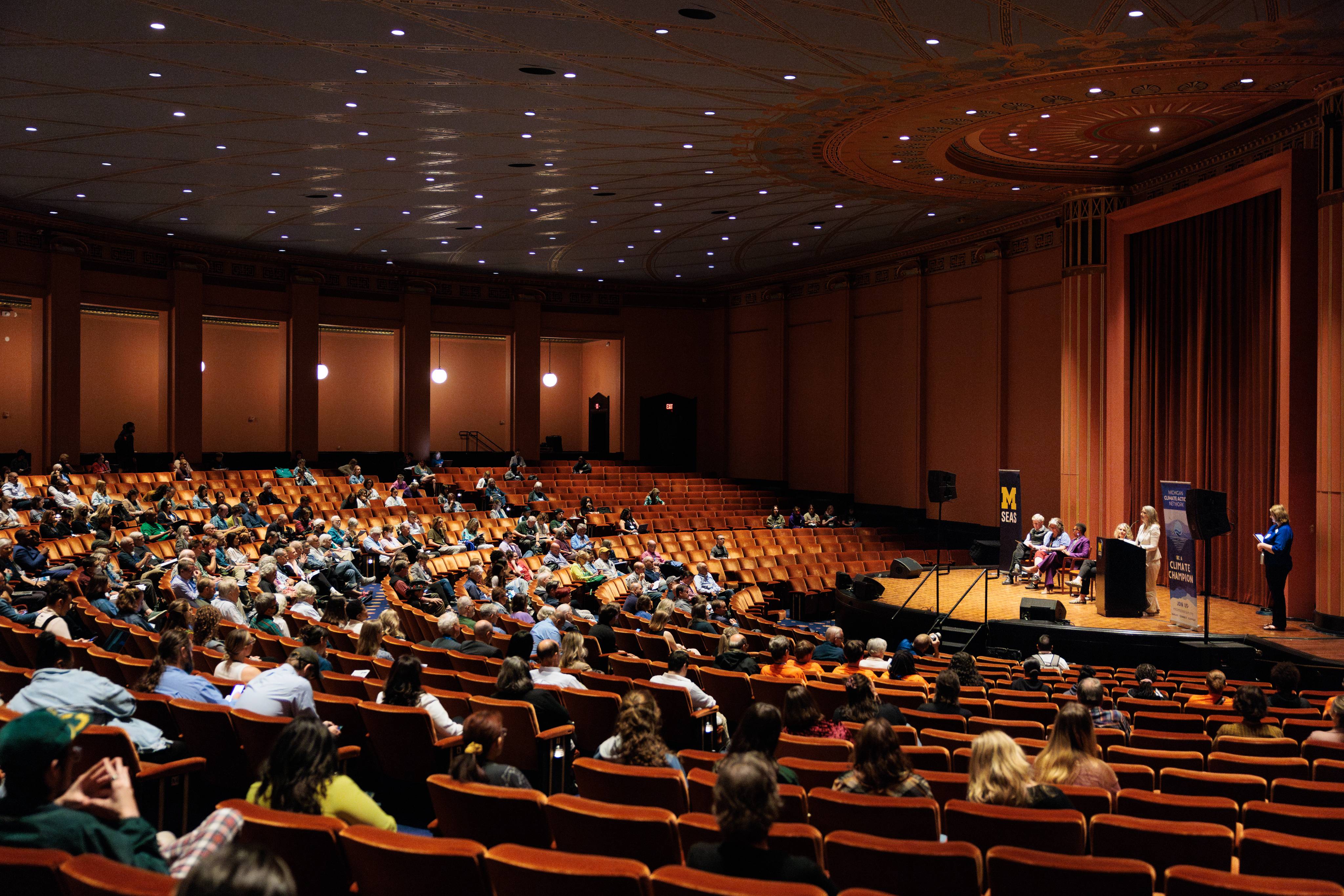 auditorium filled with people 