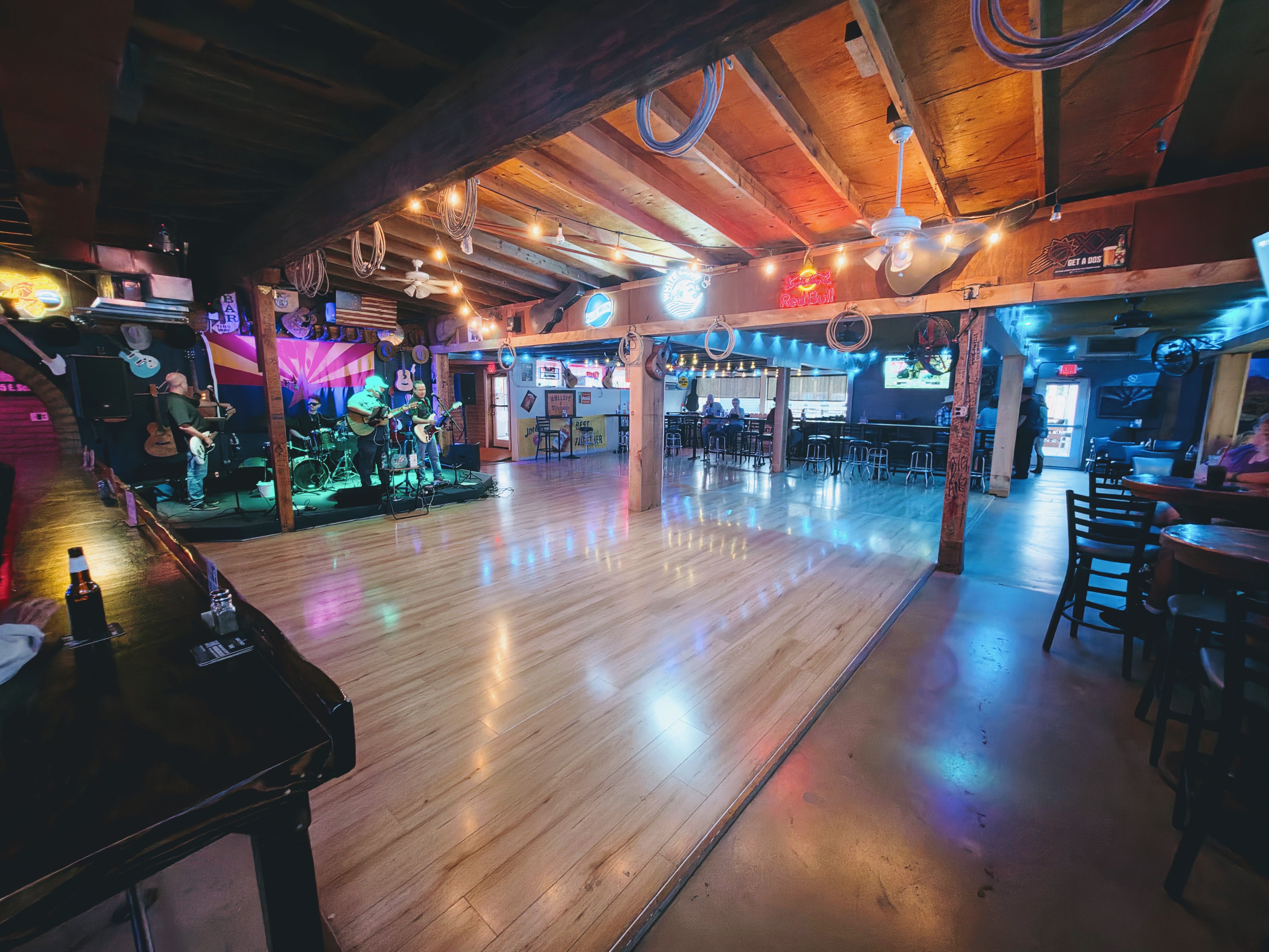 Image of the dance floor with a band on stage