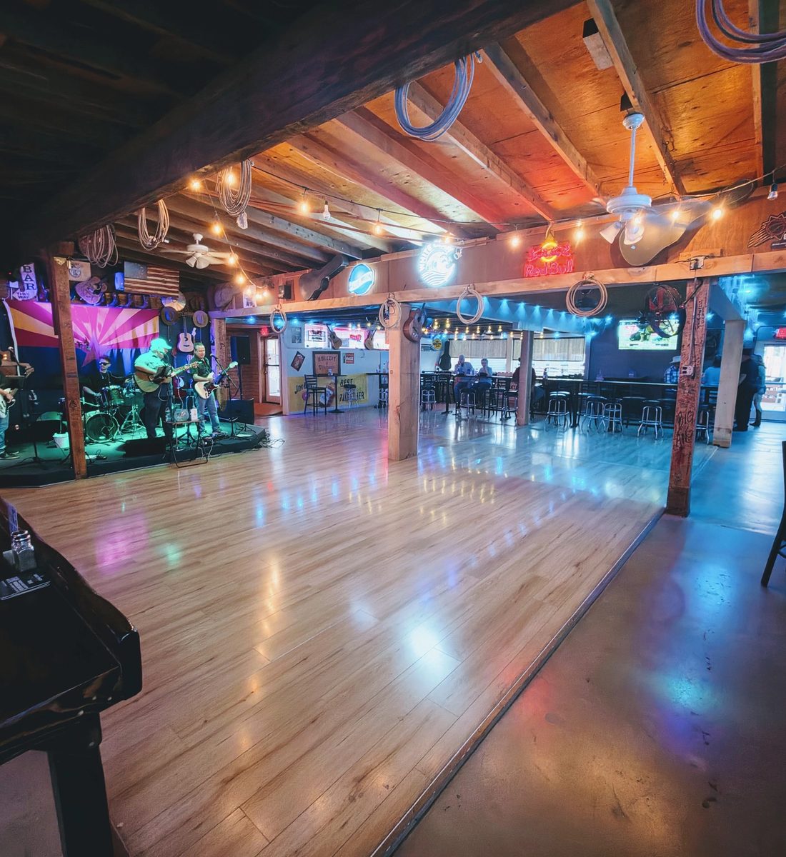 Image of the dance floor with a band on stage