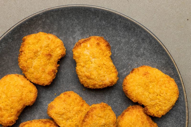 Air fried chicken nuggets on a plate