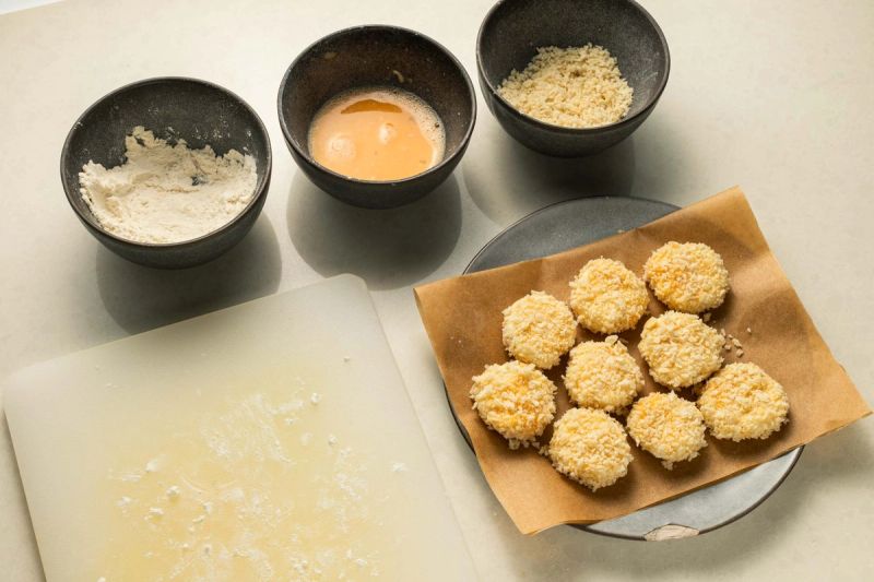 Breaded goats cheese on a plate Breaded goats cheese on a plate