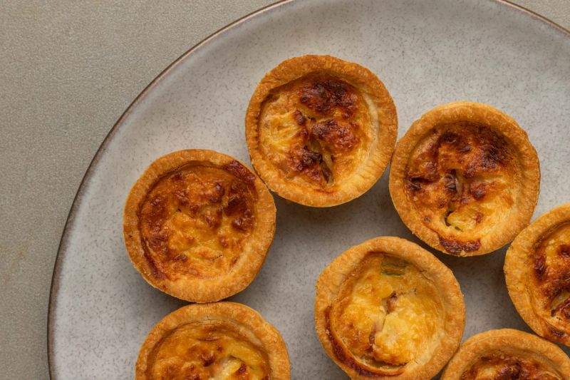 Plate of air fried mini quiches Plate of air fried mini quiches