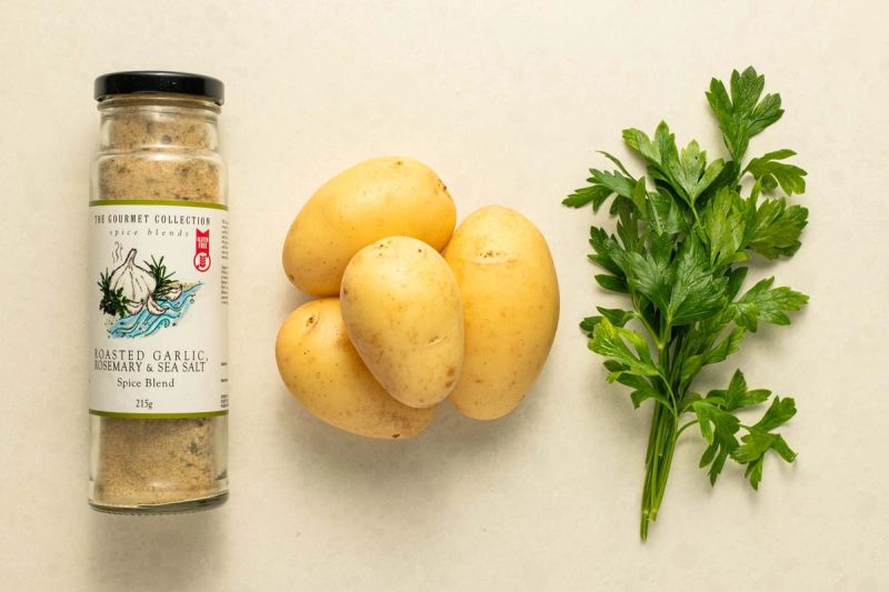 rosemary salt, potatoes, and fresh parsley on bench
