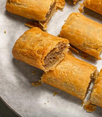 Air fried sausage rolls on a plate