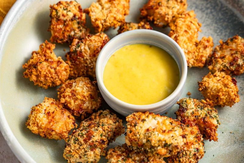 Air fried chicken bites with sweet mustard sauce