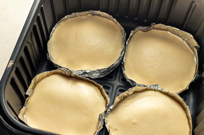 Half-cooked pancakes in foil trays