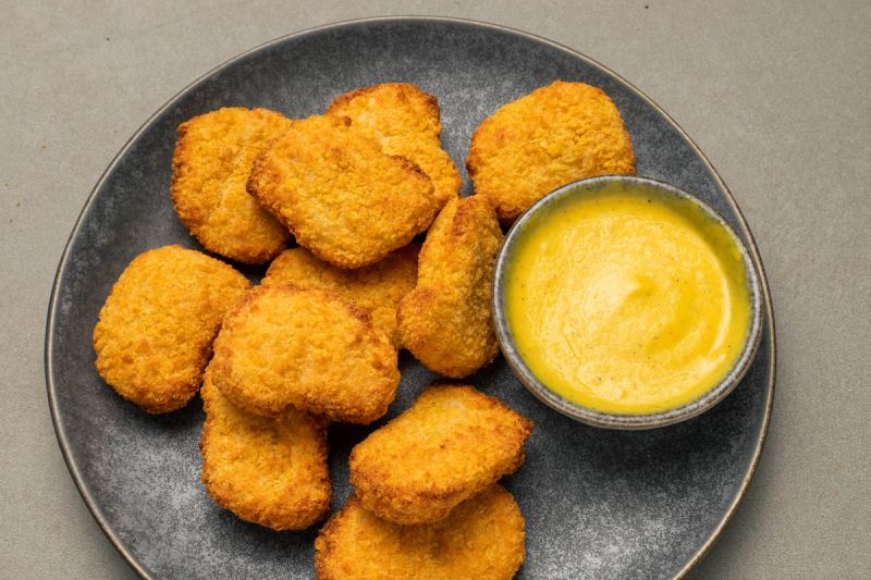 Air fried chicken nuggets with honey mustard dipping sauce Air fried chicken nuggets with honey mustard dipping sauce