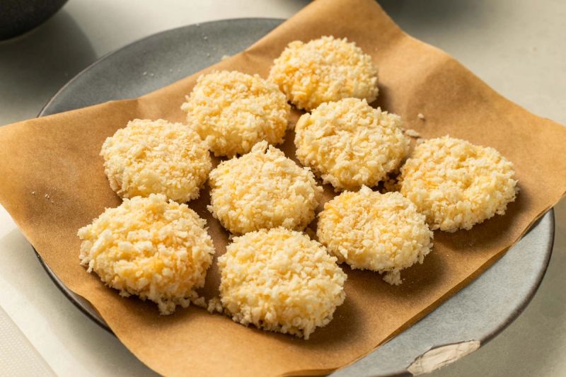 Breaded goats cheese on a plate