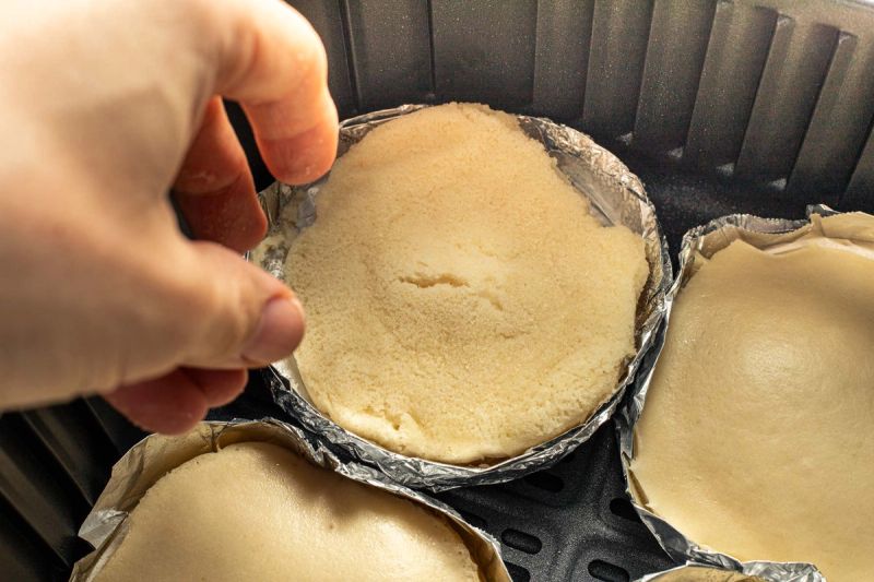 Flipped pancake in air fryer basket