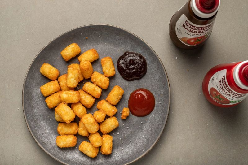 Air fried potato gems with bbq and tomato sauce.