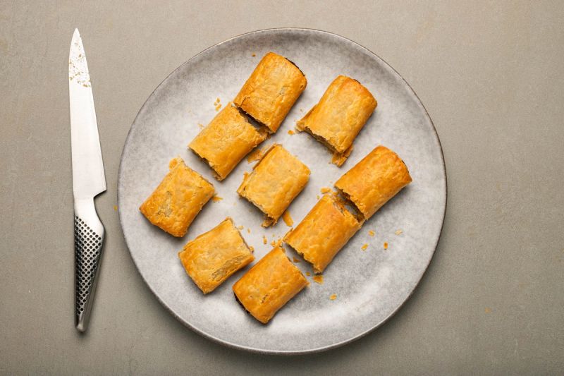 Sliced sausage rolls on a plate