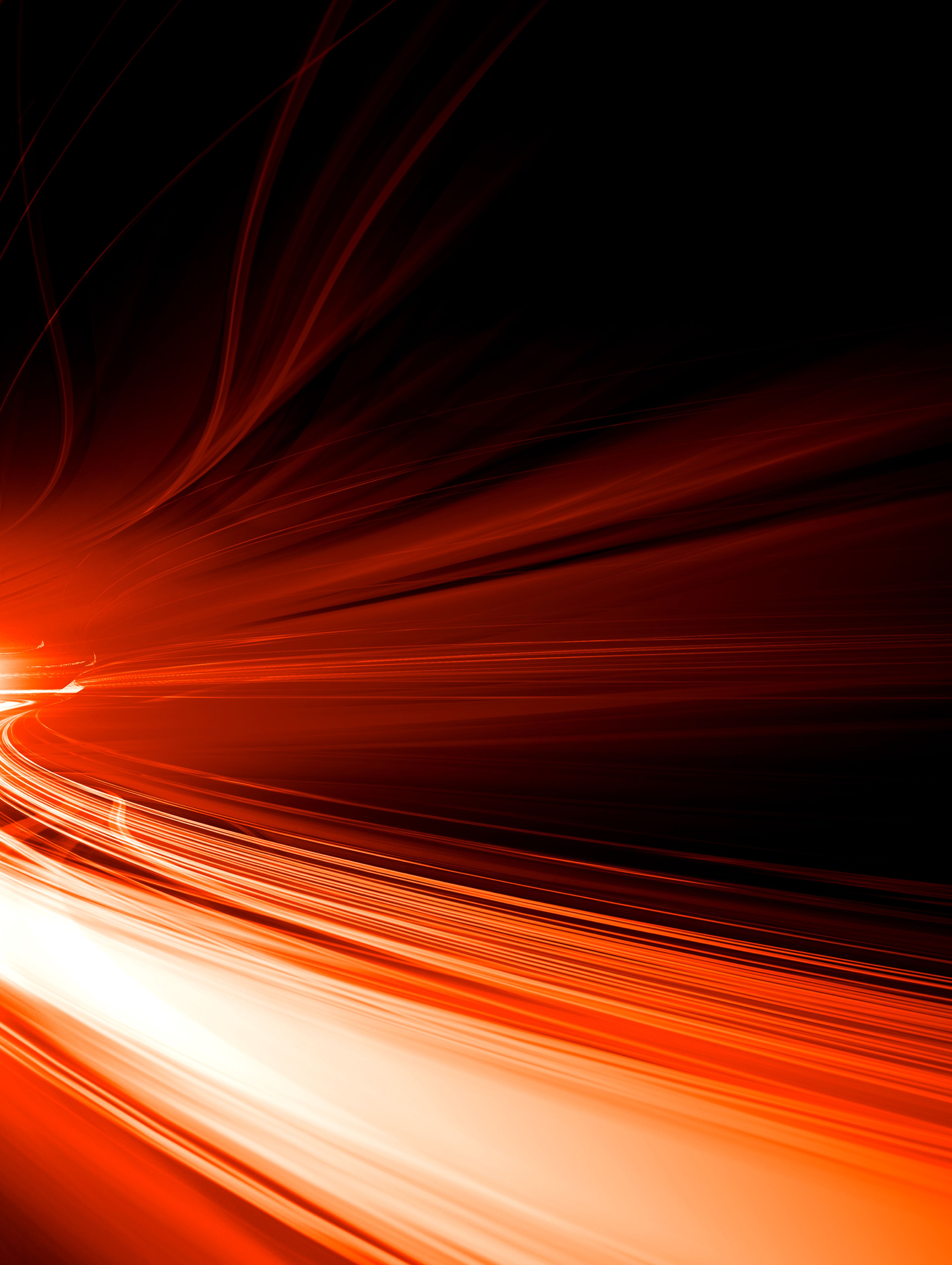Black background image with red, orange and white light flares