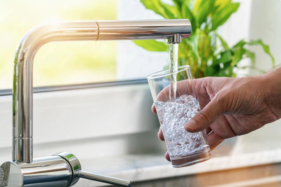 A clean, premium glass of alkaline drinking water