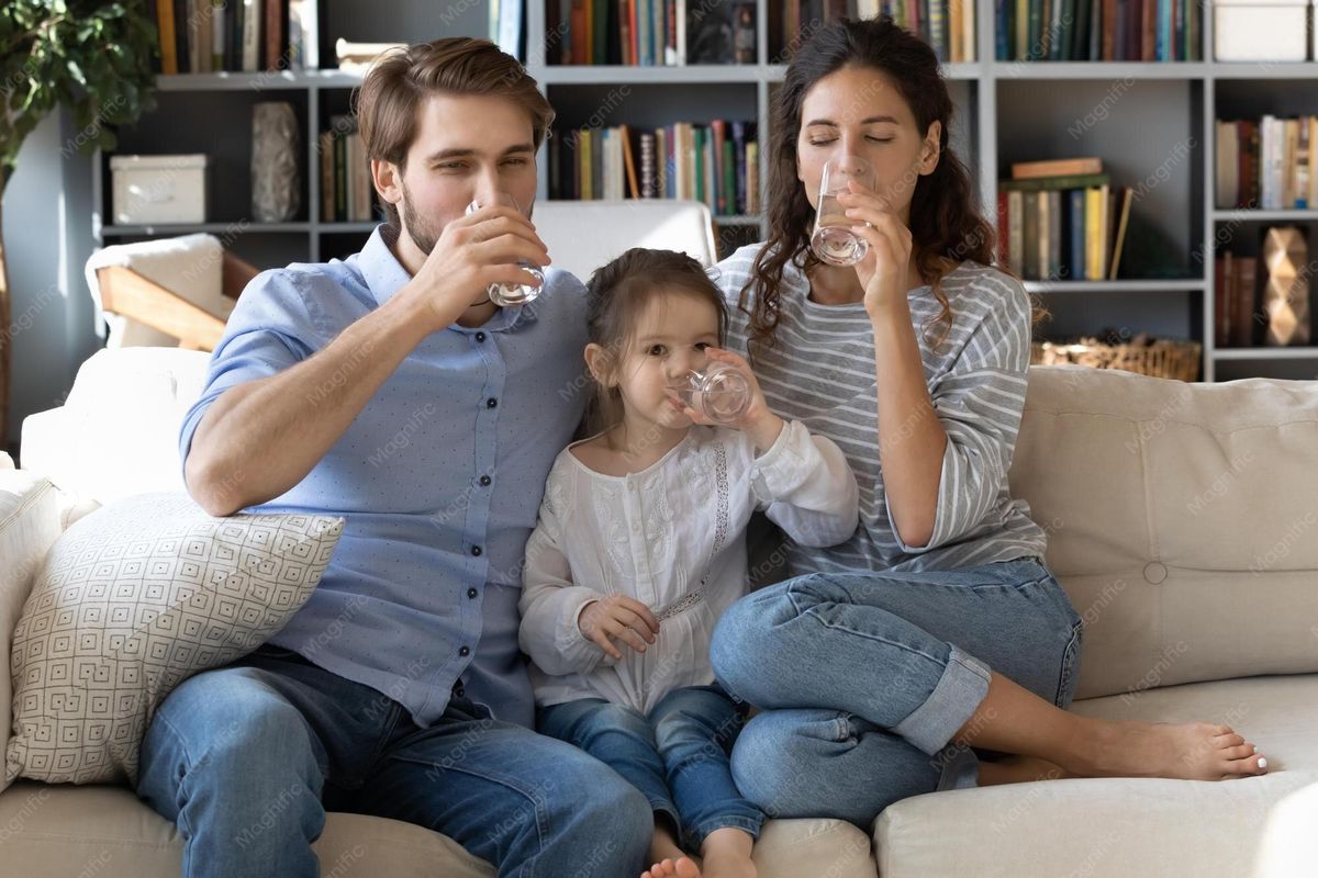 Australian family enjoying clean filtered drinking water in a modern kitchen