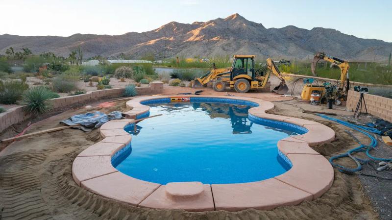 677ec2cfbf8f38ef9ce90e97 a photo of a fiberglass inground pool in X5pHnACUSf2roFo8jtFYkw cOJWm1wwQGaYNwxdB33fsg