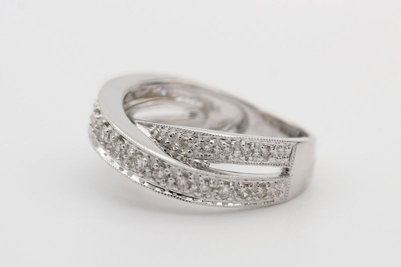 A diamond pavé crossover ring