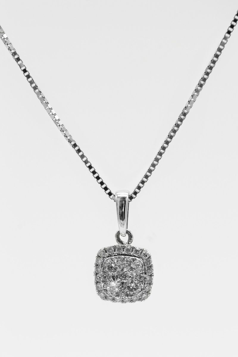 A small cushion halo diamond pendant