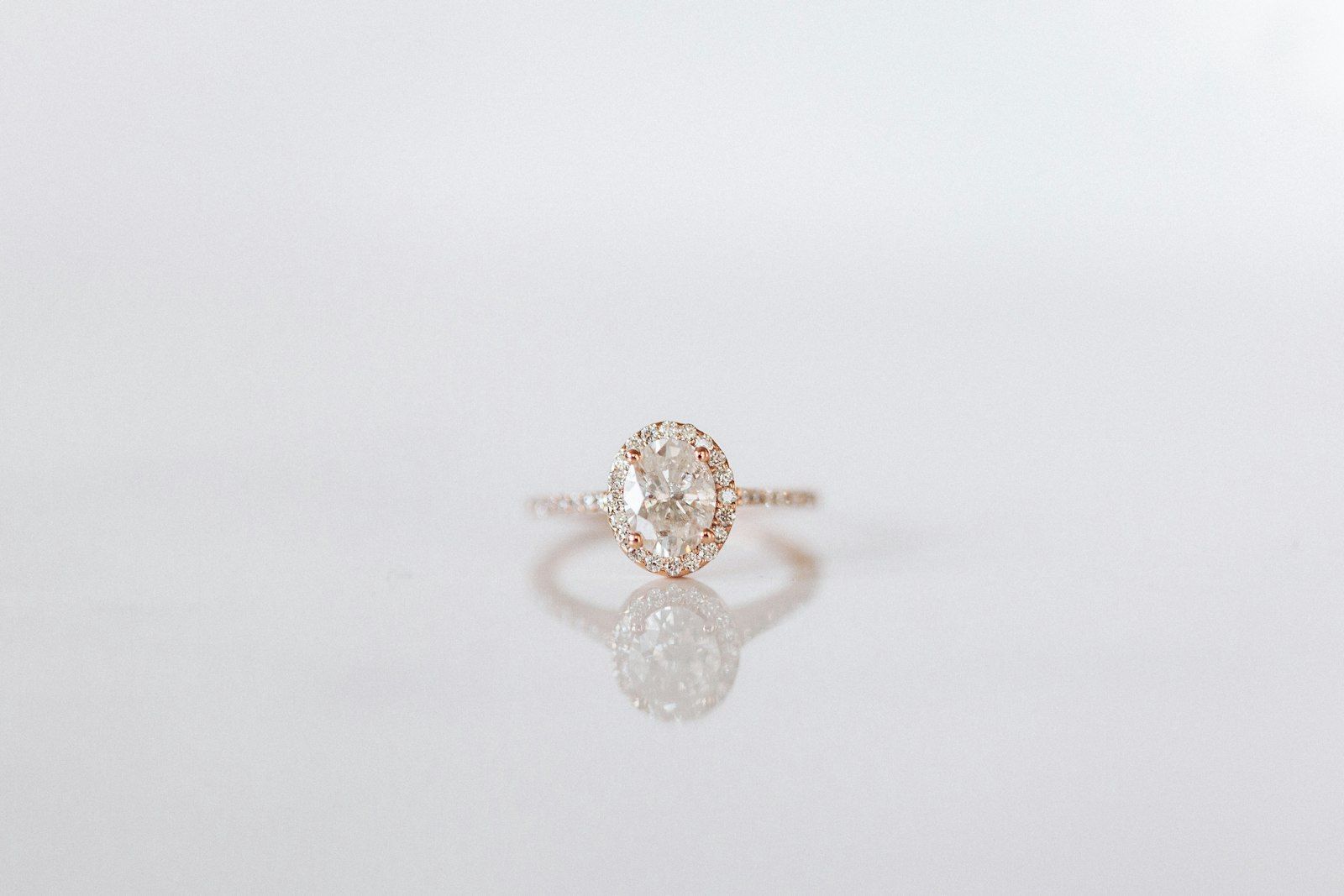 An oval diamond ring in rose gold