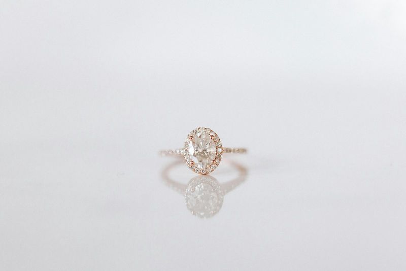 An oval diamond ring in rose gold
