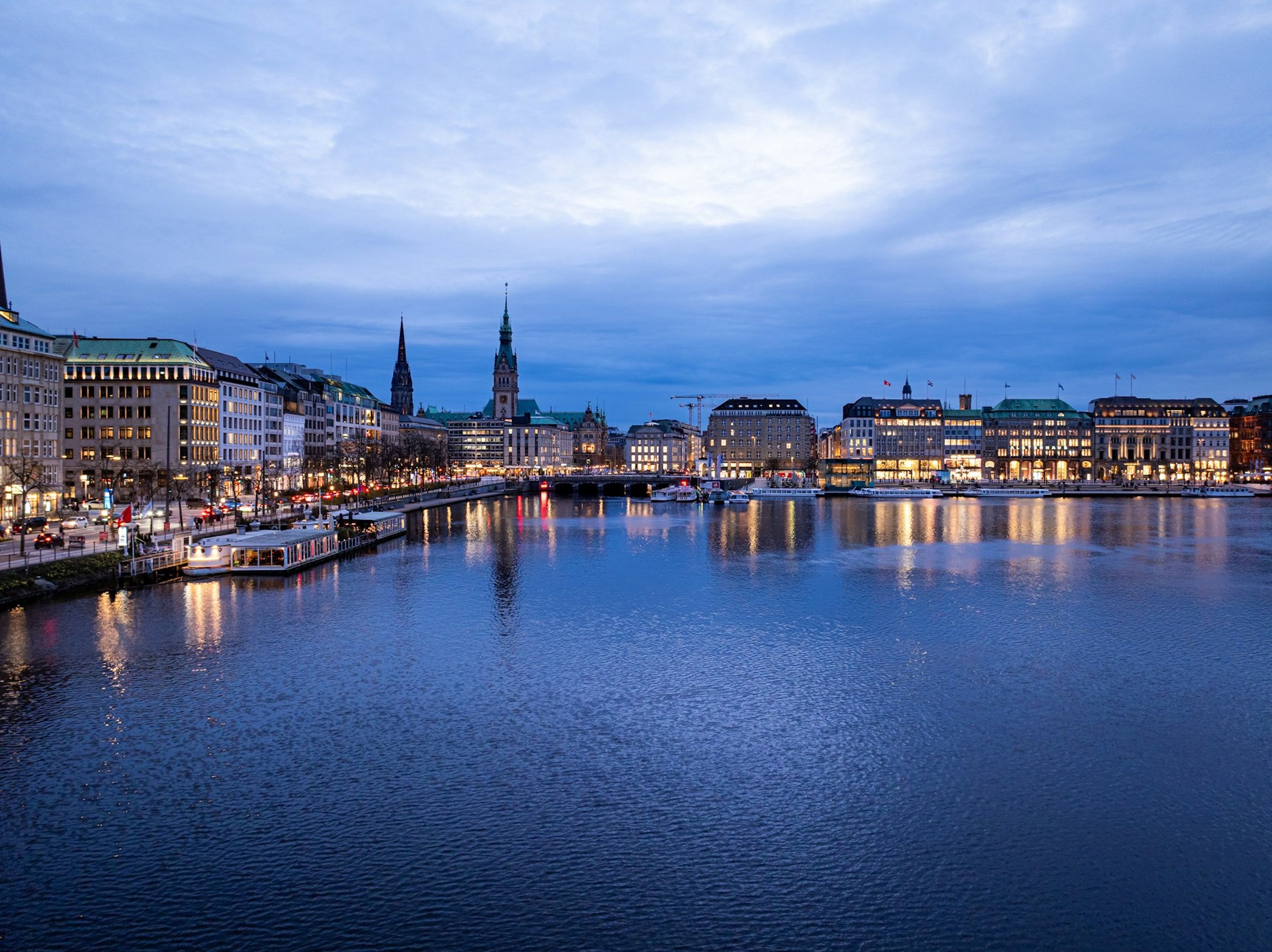 Zurich Summit 2026 — Zürich's Old Town along the Limmat at dusk
