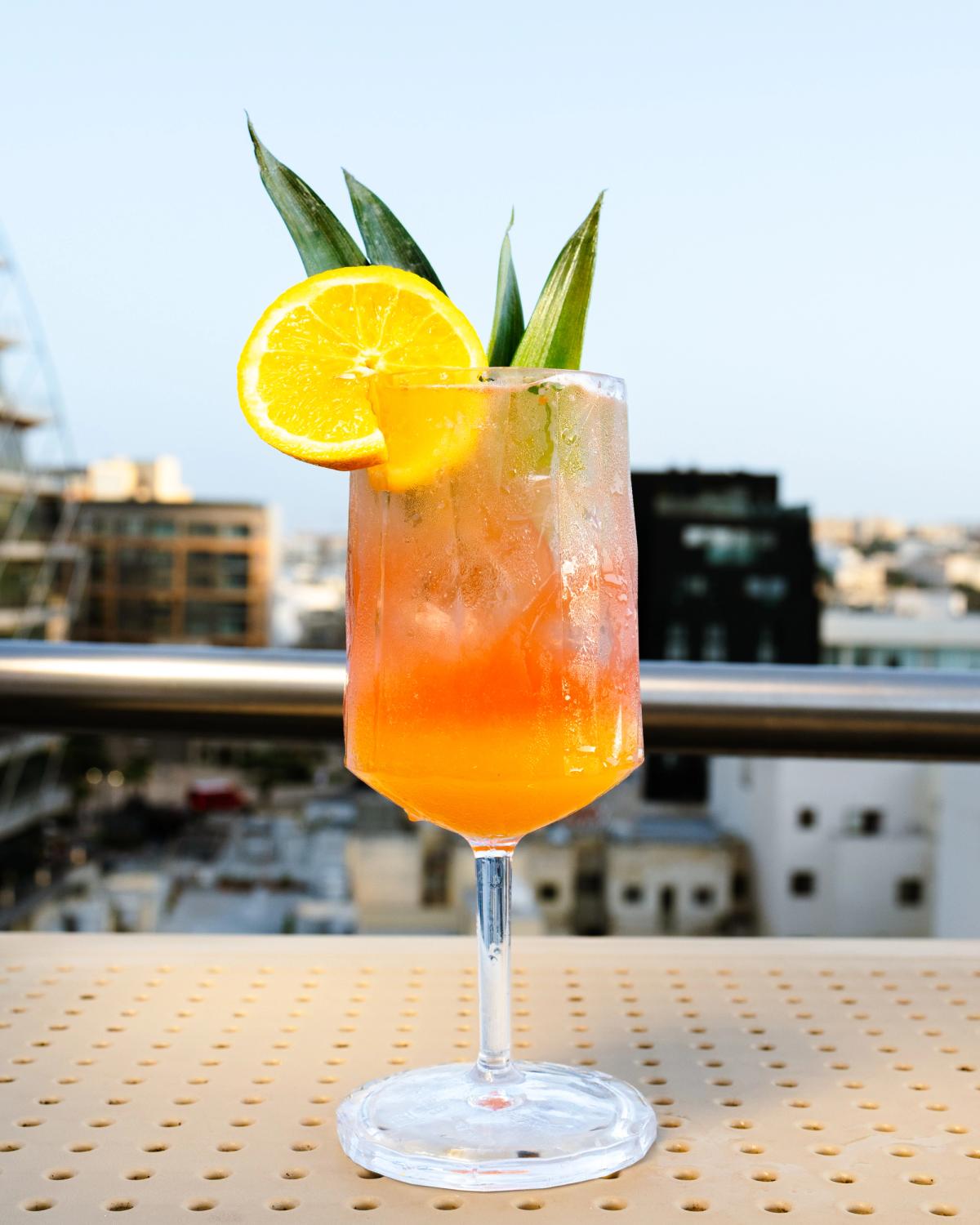 Cocktail at sunset with sea view