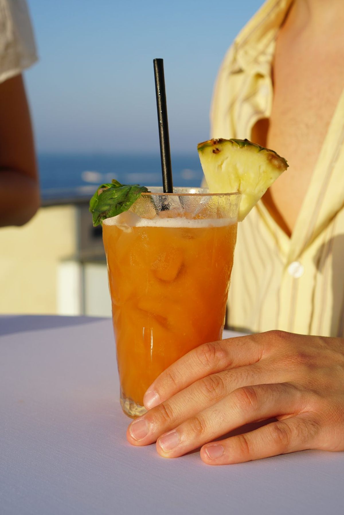 Cocktail at sunset with sea view