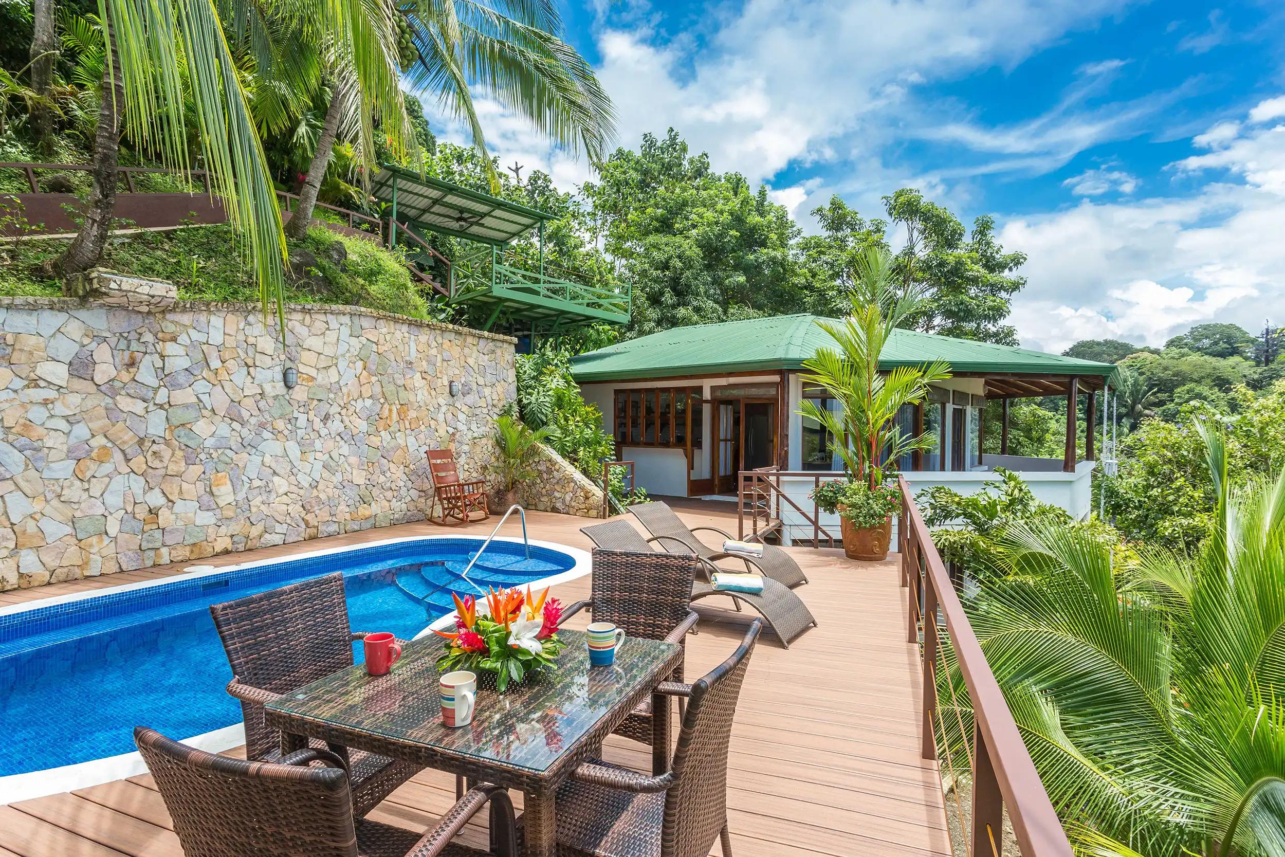 Villa Natura outdoor dining by pool