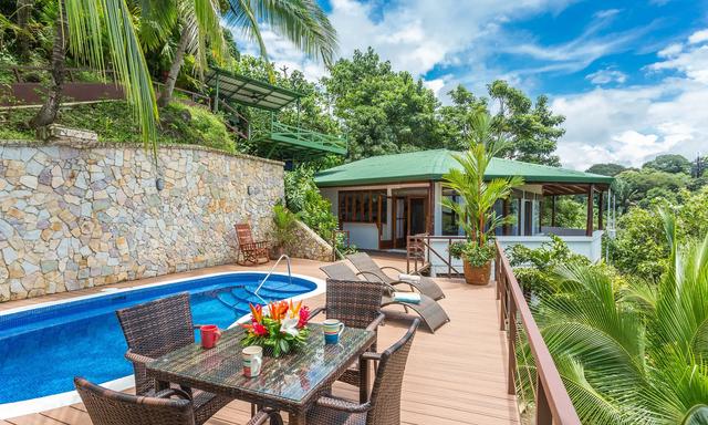 Villa Natura outdoor dining by pool