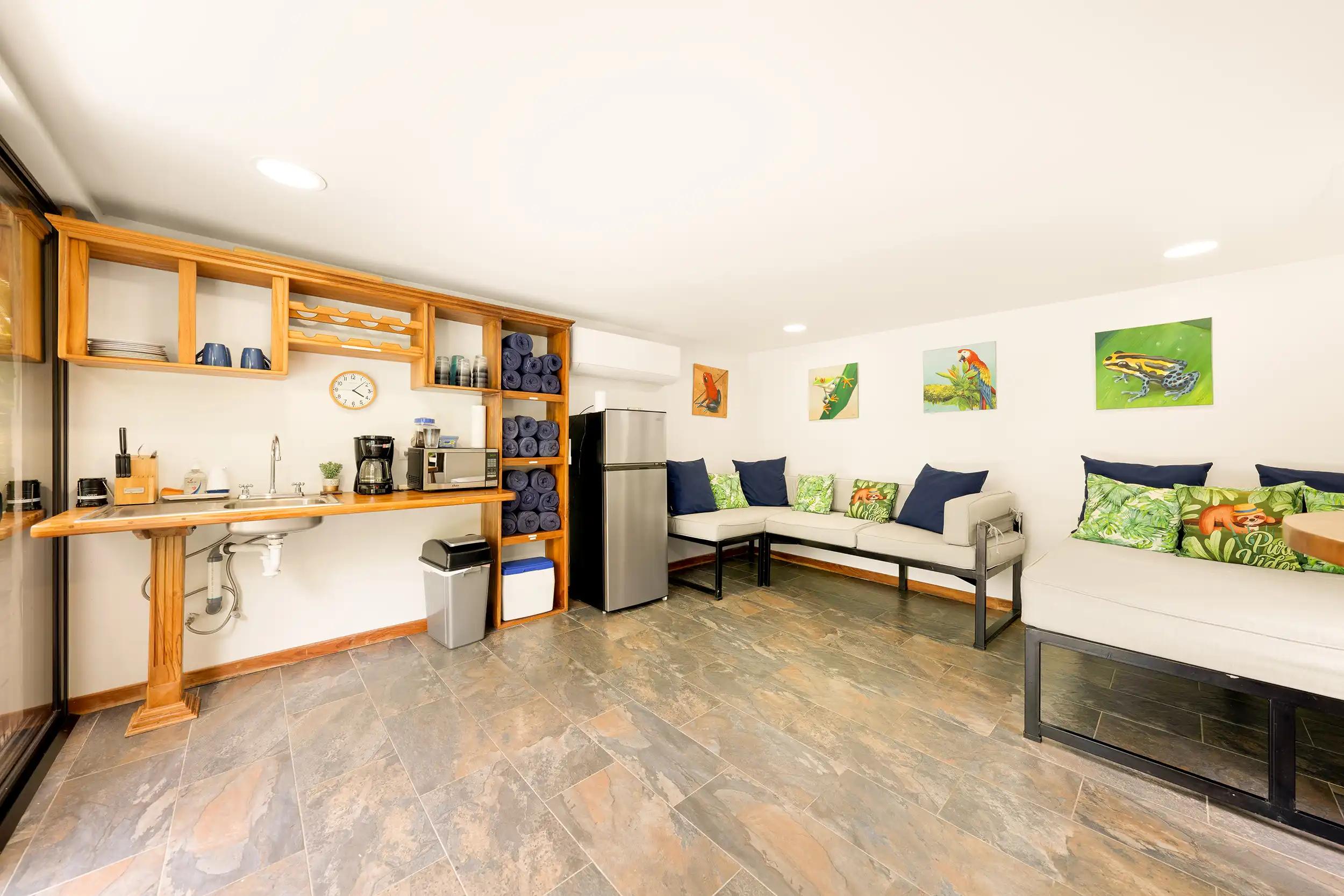 Pool lounge kitchenette at Casa Vista Verde with sink, coffee maker, and fridge