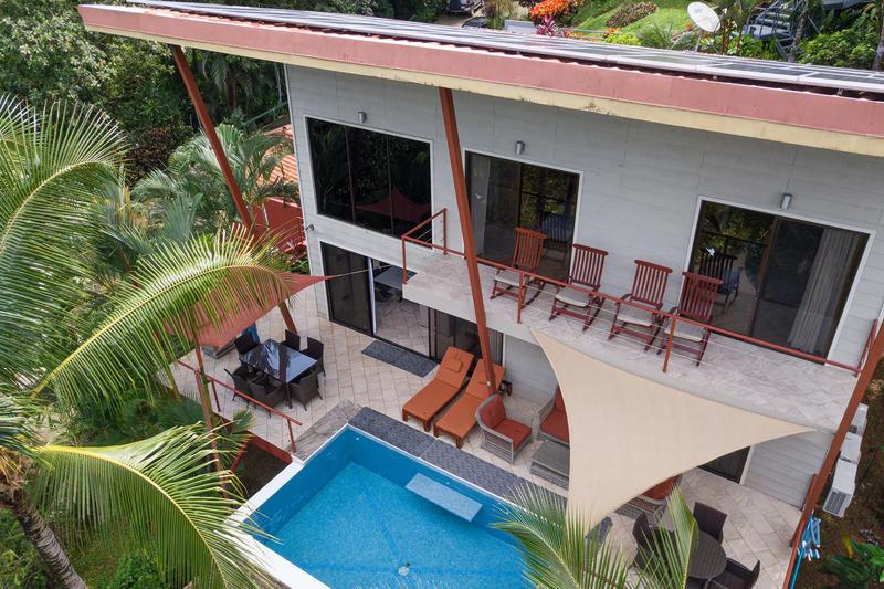 Drone view of the two story Casa Serenidad with plunge pool and shade sails