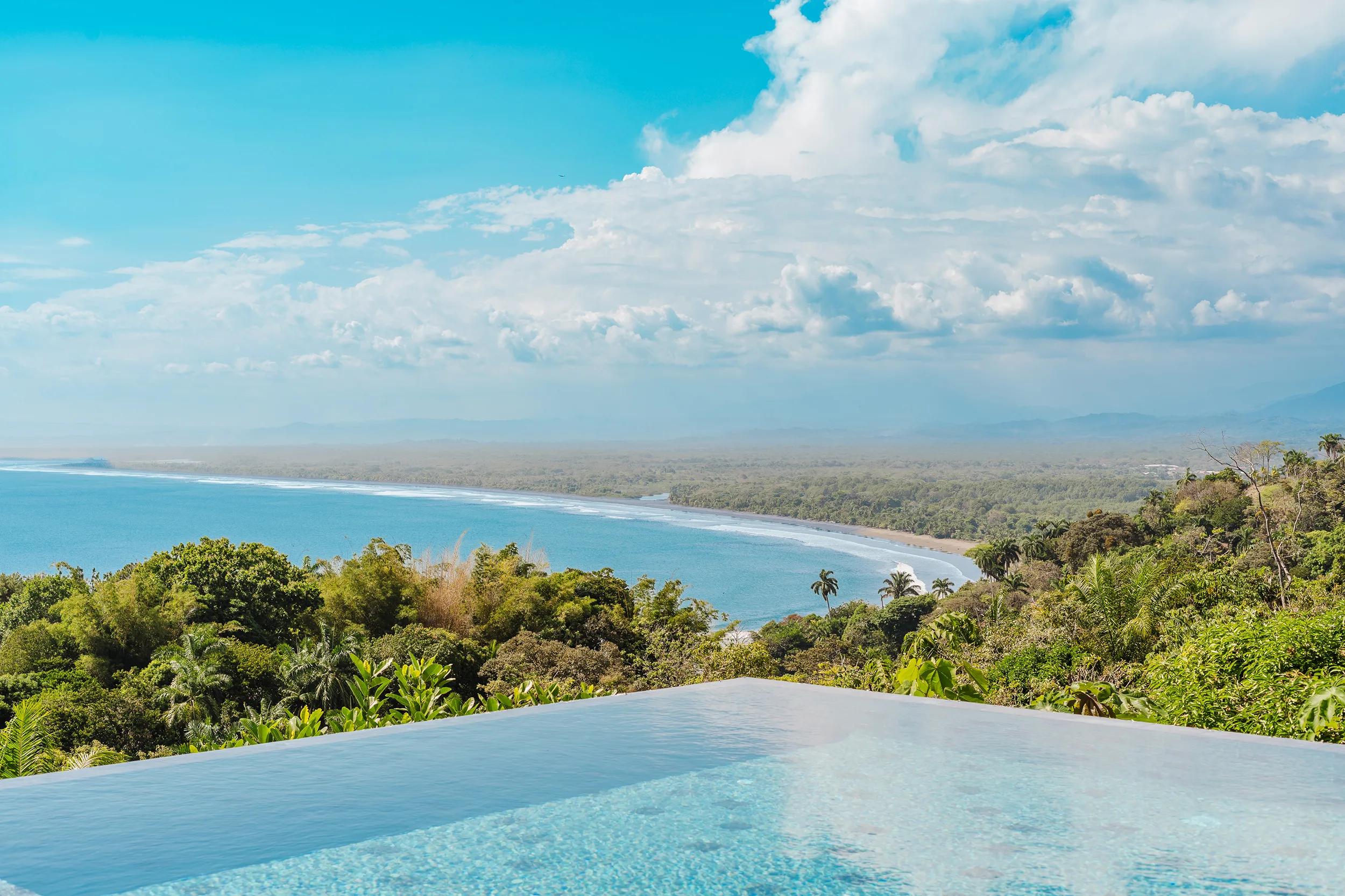 Infinity pool edge at Casa Nola dropping to the beach and the Pacific