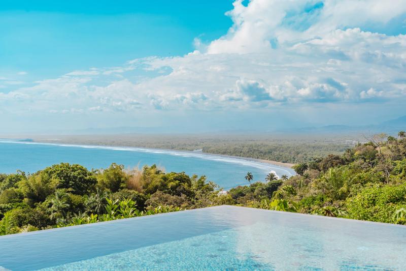 Infinity pool edge at Casa Nola dropping to the beach and the Pacific